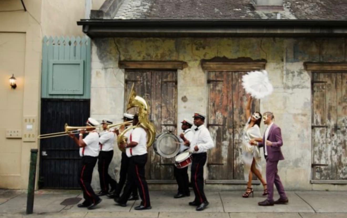 A New Orleans second line brass band parading through the French Quarter